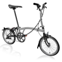 Vélo pliable Brompton M4L/mMG/rTiBK/R7/TYCC/REV/PL/Ti Storm Grey/Titanium Black 2023